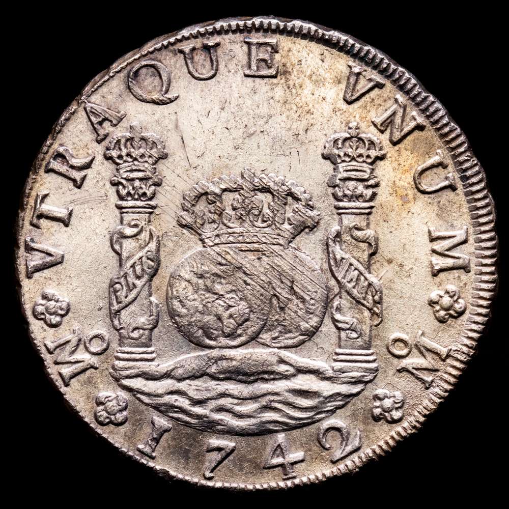 Felipe V (1700-1746). 8 reales. 1742. México. MF. (Cal-1461). Ag. 26,91 grs. Suave pátina irregular . Atractivo ejemplar con una acuñación especialmente nítida. SC-.