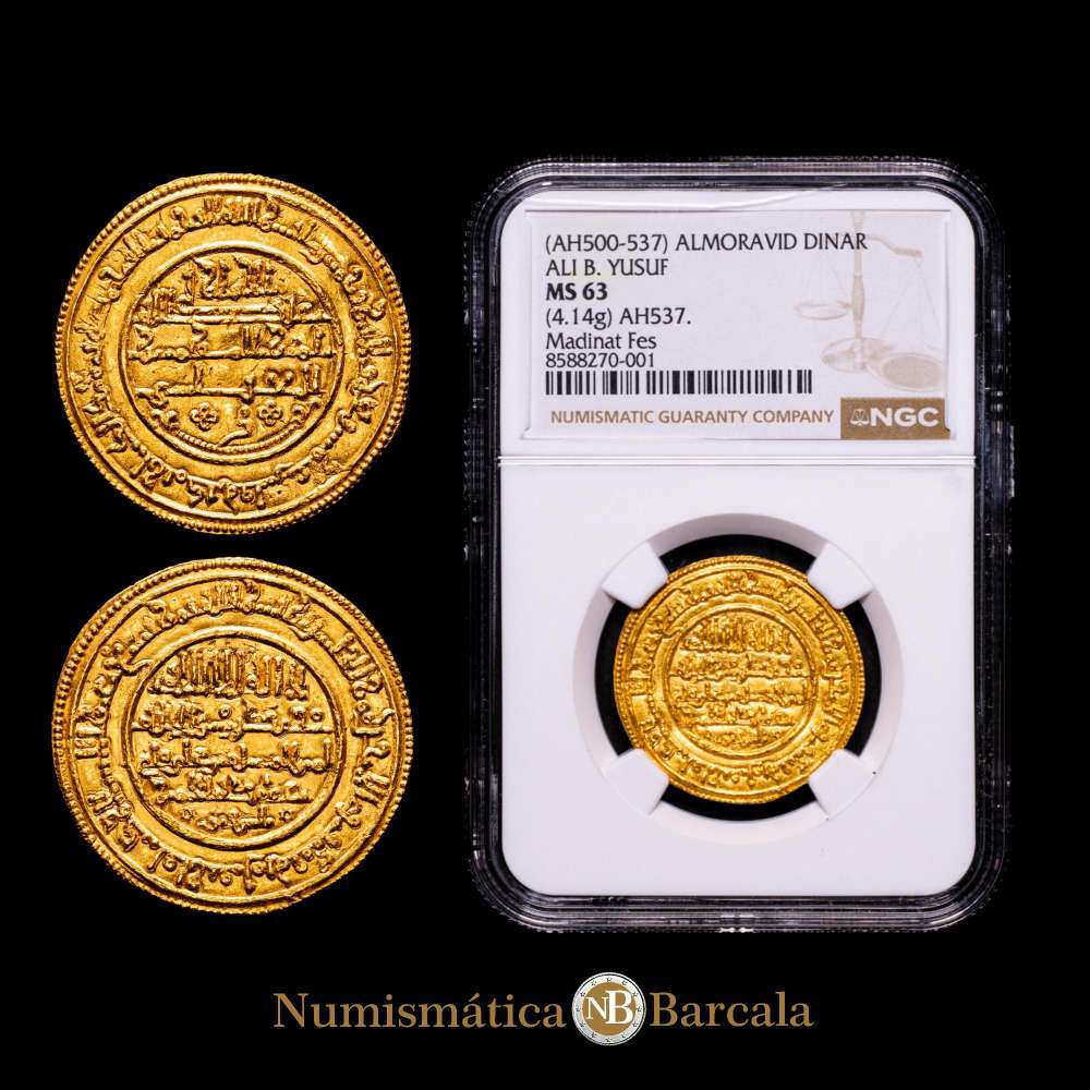 Almorávides. Alí Ibn Yusuf con el Emir Tashfin. Dinar. 537 H. Madinat Fas (Medina fez). Vives 1809; Hazard 379. Muy bella. 4,14 g. Encapsulada por NGC como MS 63.