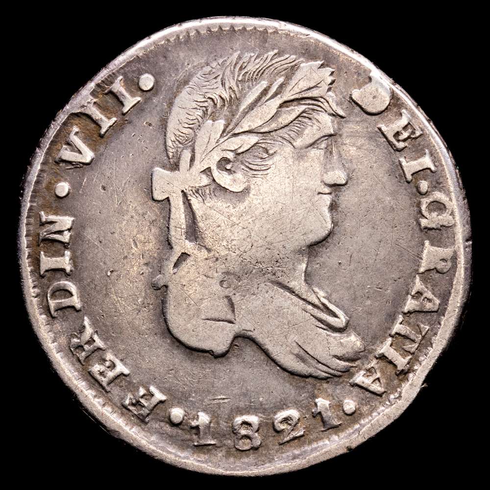 Fernando VII (1808-1833). 2 reales. 1821. Zacatecas. RG. (Cal-1014). Ag. 6,23 gramos. Centro poco recrecido, con leve pérdida de más en reverso. MBC-. Escasa.