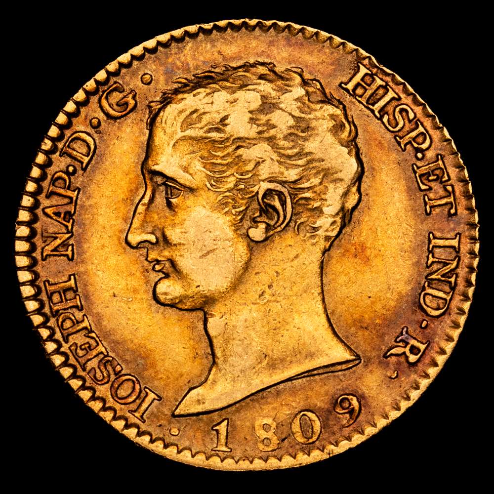 José Napoleón (1808-1814). 80 reales. 1809. Madrid. AI. (Cal-47). Au. 6,76 gramos. Busto desnudo. Primer año del tipo. Bonita pátina. Rara. MBC+.