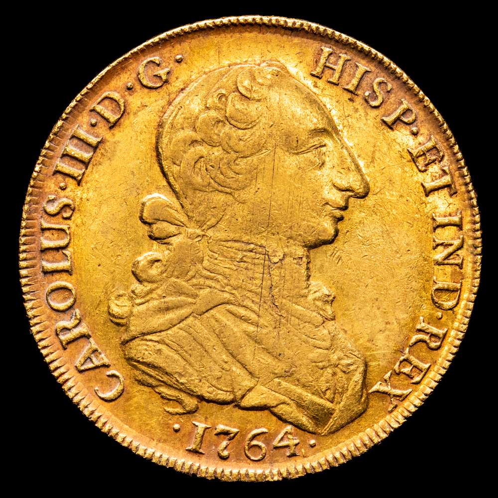 Carlos III. Lima. JM. 8 escudos. 1764. (AC. 1917) (Cal.Onza 678). Primer tipo “Cara de rata”. Bonito color, rayas de ajuste en anverso. 26,95 gramos. VF+. Rara.