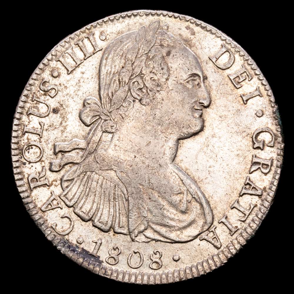 Carlos IV. México. 8 reales. 1808. TH. (26,86 g.). AC-988. Restos de concreciones limpiadas, mínimas cocas de metal. Centro del escudo ligeramente poco recrecido. MBC+.