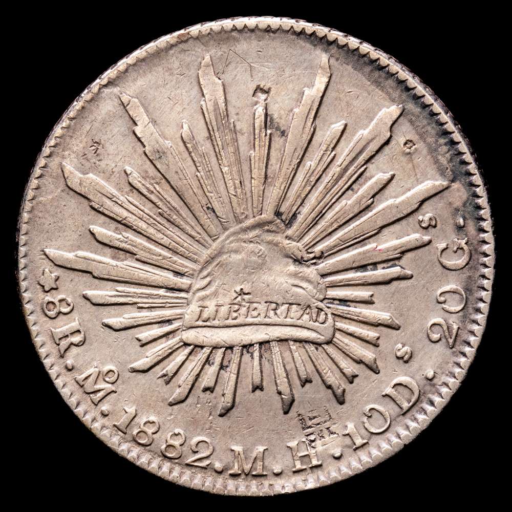 República Federal de México. 1882 Mo. MH. 8 Reales. Plata (.903) Casa de la Moneda de la Ciudad de México (2746000). KM 377.10. 26,83 gr. VF+. Resellos chinos.