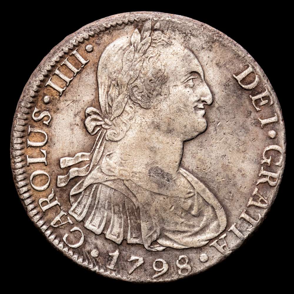Carlos IV (1788-1808). 8 reales. 1798. Lima. IJ. (Cal-916). Ag. 26,73 gr. (Oxidaciones limpiadas). MBC.