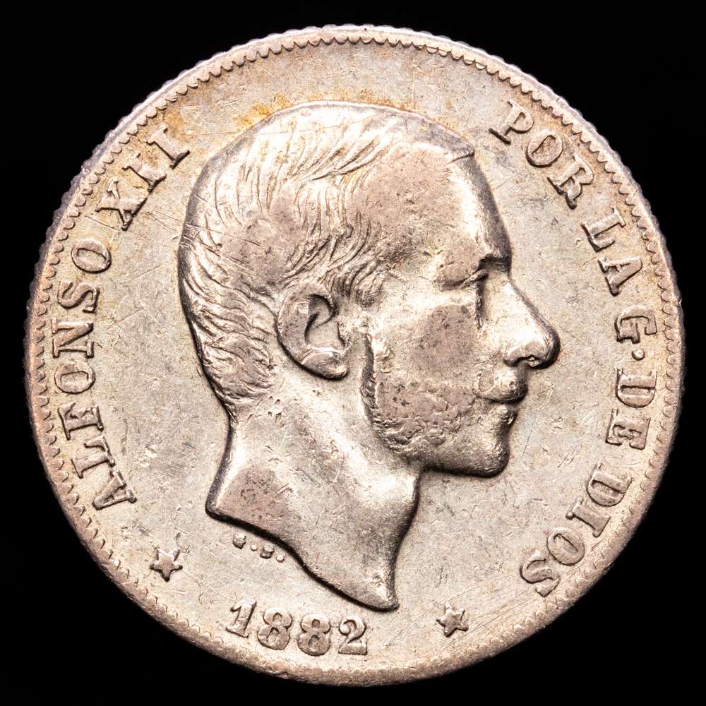 Centenario de la Peseta (1868-1931). Alfonso XII (1874-1885). 20 centavos. 1882. Manila. (Cal-107). Ag. 5,13 g. MBC.