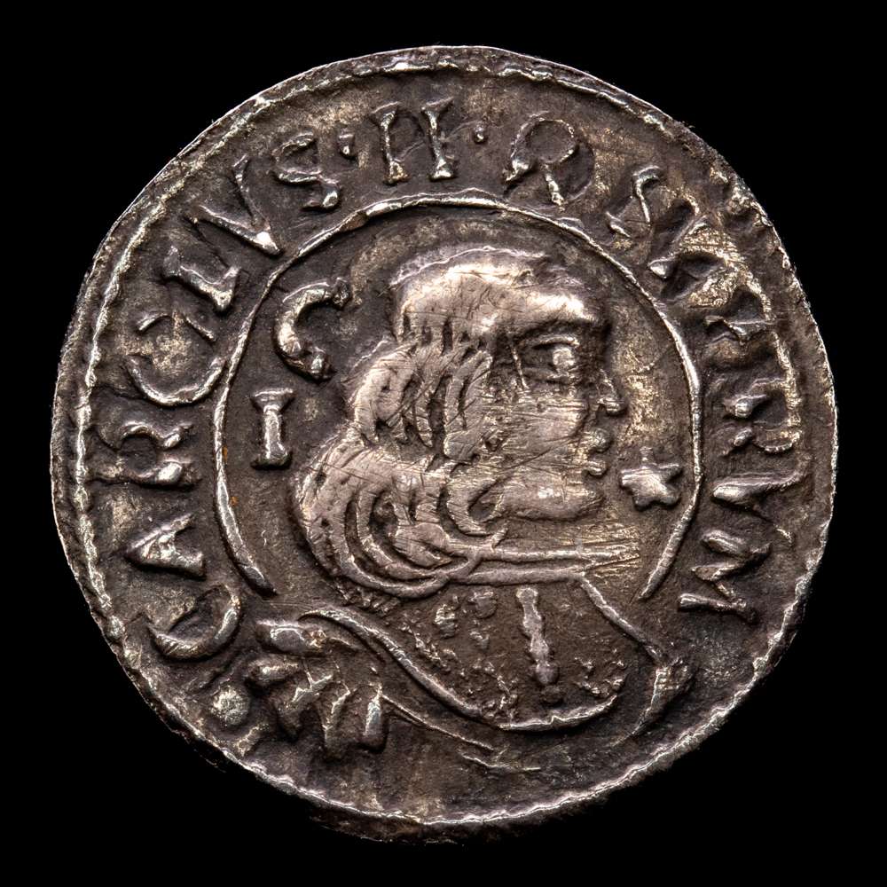 ITALIA. 1699. Carlos II. Cagliari. 1 real. (Vti. 228) (MIR. 88/8). La letra N de INIMICOS al revés. Pátina. 2,30 gramos. MBC/MBC+. Pátina oscura.