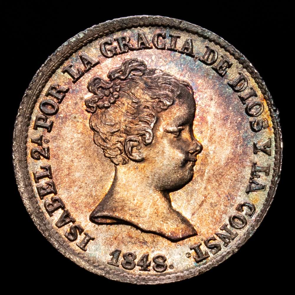 Isabel II (1833-1868). 1 real. 1848. Madrid. CL. (Cal-300). 1,29 gramos. Ag. Preciosa pátina de monetario con tonos iridiscentes en anverso, con todo su brillo original. FDC. Muy rara así.