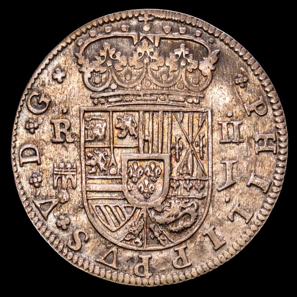 Felipe V (1700-1746). 2 reales. 1717. Segovia. J. (Cal-944). Ag. 4,93 g. Acueducto de dos arcos en un piso. Bella pátina azul oscura de monetario antiguo. Precioso ejemplar. EBC-/EBC.