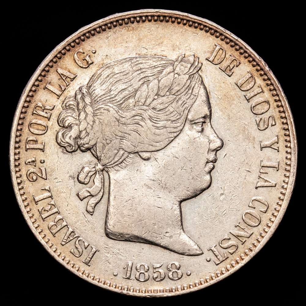 Isabel II (1833-1868). 20 reales. 1858. Madrid. (Cal-615). Ag. 25,78 gramos. Suave tono. MBC+.