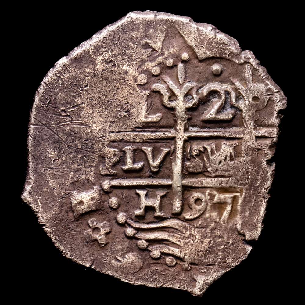 Carlos II (1665-1700). 2 reales. 1697. Lima. H. (Cal-355). Ag. 6,39 g. Doble ensayador. Visible parte del nombre del rey. Bonita pátina. Rara. MBC+.