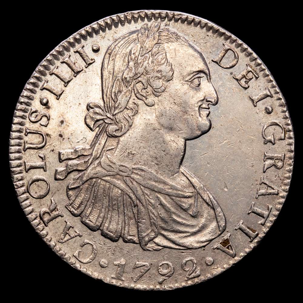 Carlos IV (1788-1808). 8 reales. 1792. México. FM. (Cal-954). Ag. 26,87 gramos. Restos de brillo originales. Ligeramente limpiada, pero buen ejemplar. EBC-.